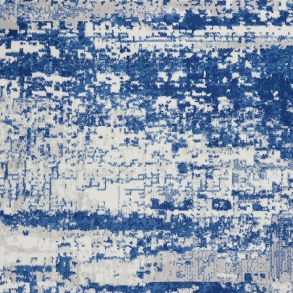 HomeRoots 6' Ivory and Blue Ombre Distressed Area Rug - Contemporary Design for Warmth and Style in Any Room 6' X 9' 385852