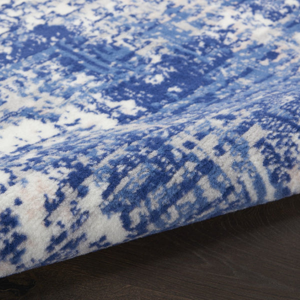 HomeRoots 6' Blue and Ivory Abstract Distressed Area Rug - Contemporary Design for Stylish Living Spaces 6' X 9' 385861