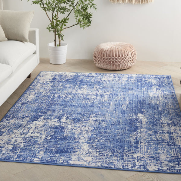 HomeRoots 6' Blue and Ivory Abstract Distressed Area Rug - Contemporary Design for Stylish Living Spaces 6' X 9' 385861