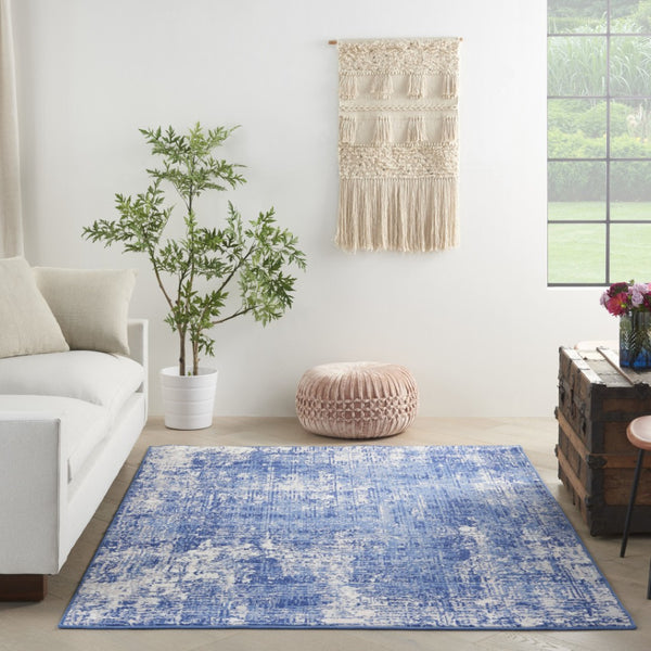 HomeRoots 6' Blue and Ivory Abstract Distressed Area Rug - Contemporary Design for Stylish Living Spaces 6' X 9' 385861