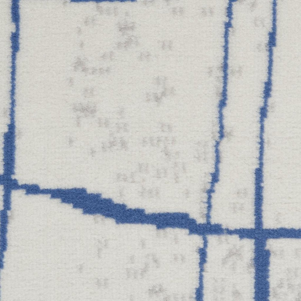 HomeRoots 6' Modern Ivory and Blue Geometric Distressed Area Rug for Stylish Living Spaces and Warmth 6?x9? 385864