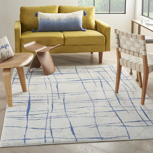 HomeRoots 6' Modern Ivory and Blue Geometric Distressed Area Rug for Stylish Living Spaces and Warmth 6?x9? 385864
