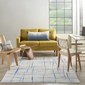 HomeRoots 6' Modern Ivory and Blue Geometric Distressed Area Rug for Stylish Living Spaces and Warmth 6?x9? 385864