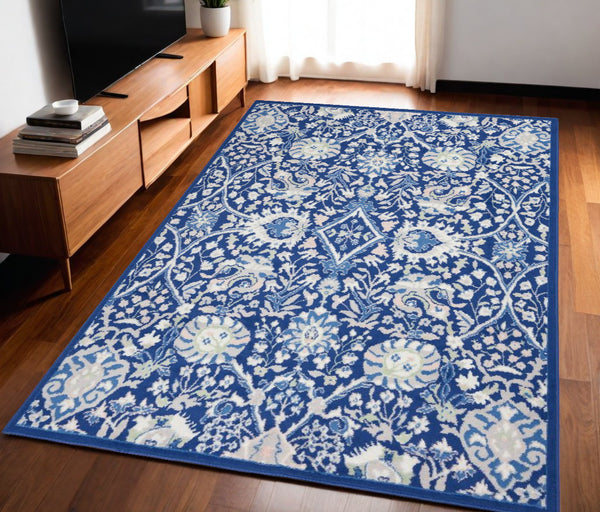 Homeroots 5' X 7' Navy Blue Floral Dhurrie Area Rug  Polypropylene 385866