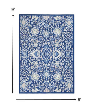 Homeroots 6' X 9' Navy Blue Floral Dhurrie Area Rug  Polypropylene 385867