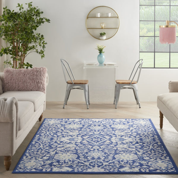 HomeRoots 6' Blue and Ivory Floral Area Rug - Timeless Elegance for Living Rooms, Bedrooms, and Dining Areas 6' X 9' 385867