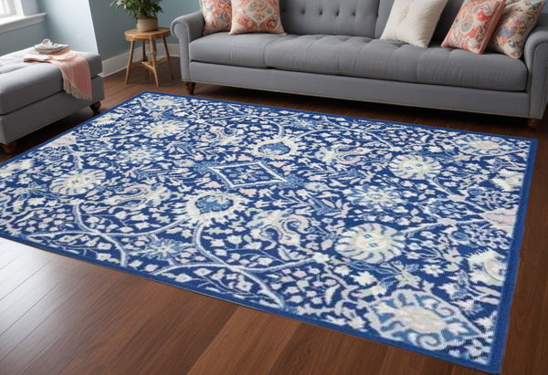 Homeroots 6' X 9' Navy Blue Floral Dhurrie Area Rug  Polypropylene 385867
