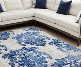 Homeroots 6' X 9' Navy Blue Floral Dhurrie Area Rug Ivory Navy Polypropylene 385870