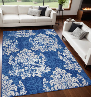 Homeroots 5' X 7' Blue And Ivory Floral Dhurrie Area Rug Navy Ivory Polypropylene 385872