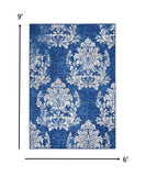 Homeroots 6' X 9' Blue And Ivory Floral Dhurrie Area Rug Navy Ivory Polypropylene 385873