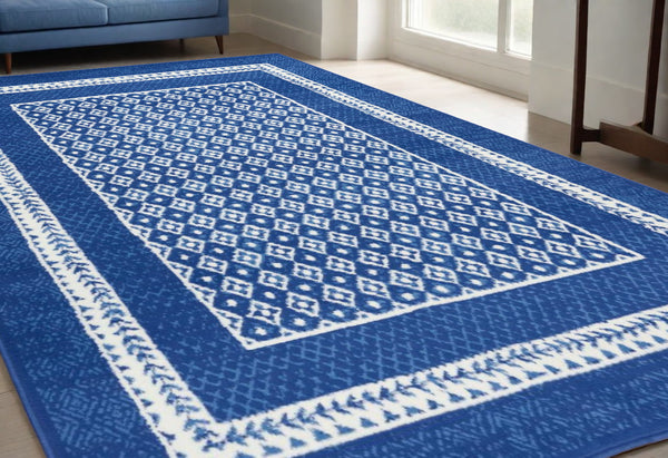 Homeroots 5' X 7' Navy Blue Geometric Dhurrie Area Rug  Polypropylene 385884