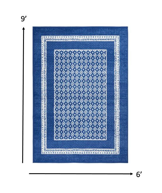 Homeroots 6' X 9' Navy Blue Geometric Dhurrie Area Rug  Polypropylene 385885