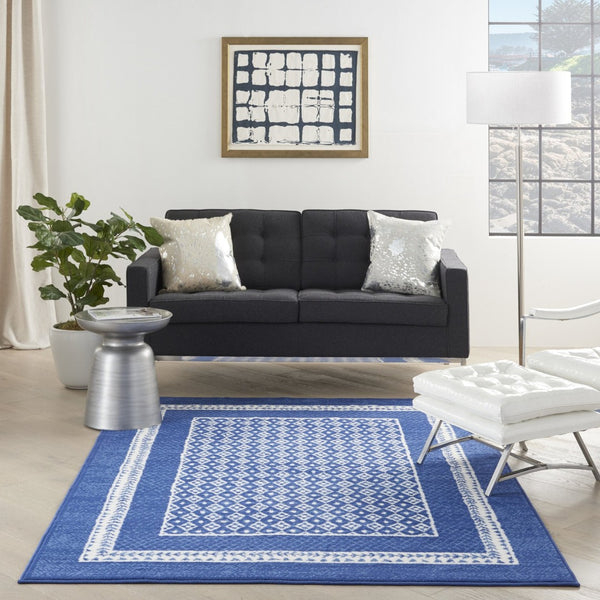 HomeRoots 6' Contemporary Ivory and Blue Geometric Area Rug - Stylish, Durable, and Perfect for Any Room 6?x9? 385885