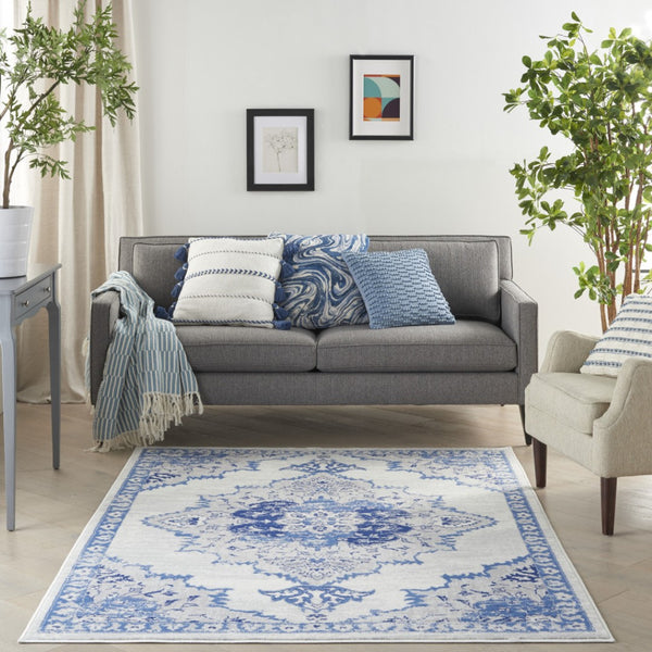 HomeRoots 6' Elegant Ivory and Blue Floral Area Rug - Timeless Design for Living Rooms and Bedrooms 6' X 9' 385888
