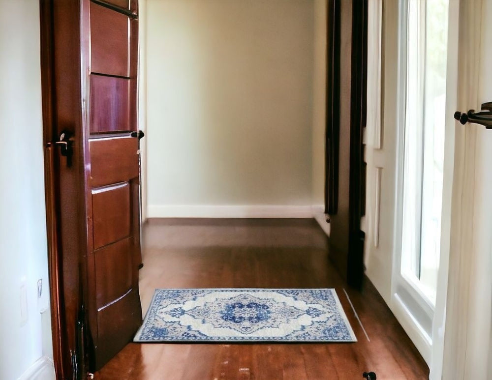 HomeRoots 6' Elegant Ivory and Blue Floral Area Rug - Timeless Design for Living Rooms and Bedrooms 6' X 9' 385888