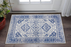 HomeRoots 6' Ivory and Blue Geometric Distressed Area Rug – Modern Design for Timeless Appeal in Any Room 6' X 9' 385891