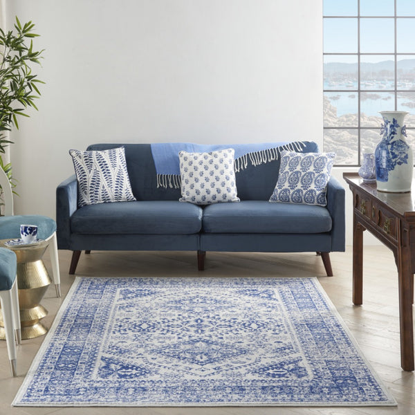 HomeRoots 6' Ivory and Blue Geometric Distressed Area Rug – Modern Design for Timeless Appeal in Any Room 6' X 9' 385891