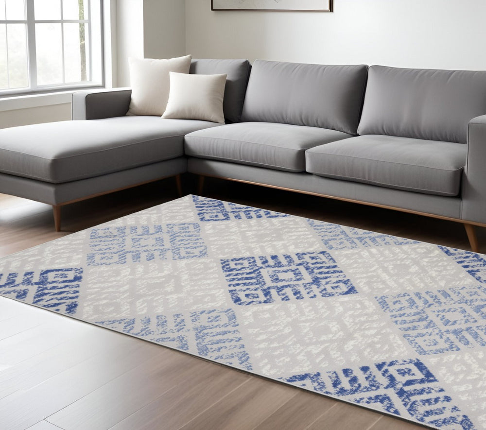 HomeRoots 6' Blue and Gray Geometric Area Rug - Modern Design for Living Spaces, Durable, Stylish, and Versatile 6' X 9' 385906