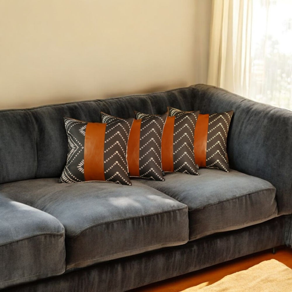 HomeRoots Set of 4 Black and White Geometric Lumbar Pillow Covers with Luxe Faux Leather Accents for Style 386827