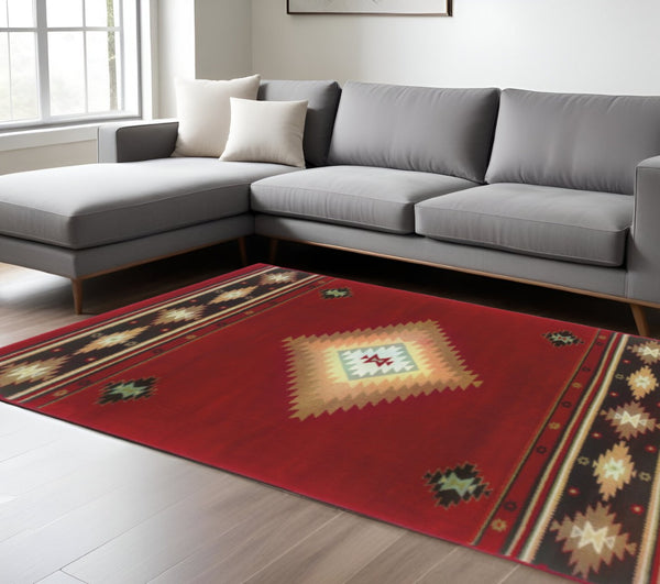 HomeRoots 4' Bold Red and Beige Ikat Pattern Area Rug - Bohemian Charm, Durable, Stain Resistant, Cozy Style 7' X 10' Rectangle 387972
