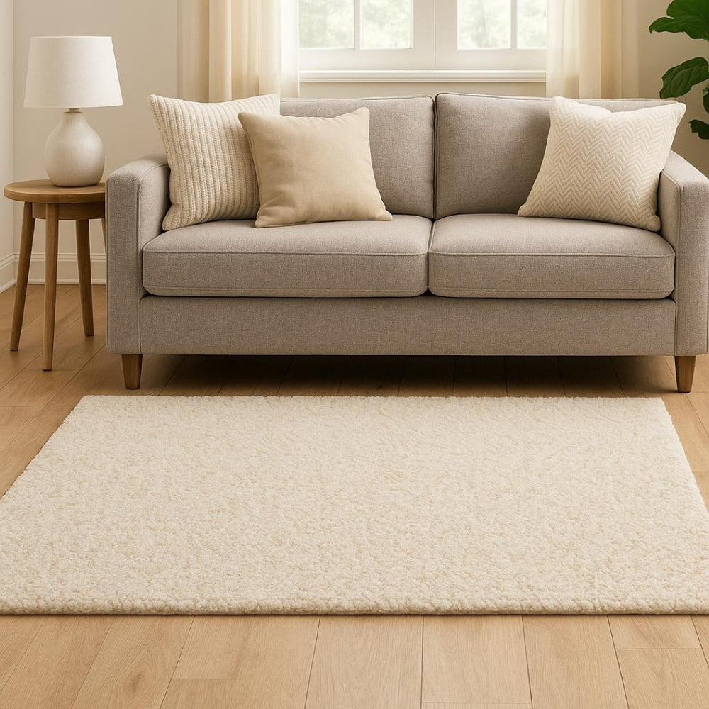 HomeRoots 3' Ivory Shag Area Rug - Luxurious Hand-Tufted Comfort for Living Rooms, Bedrooms & More 6'6" x 9'6" 387980