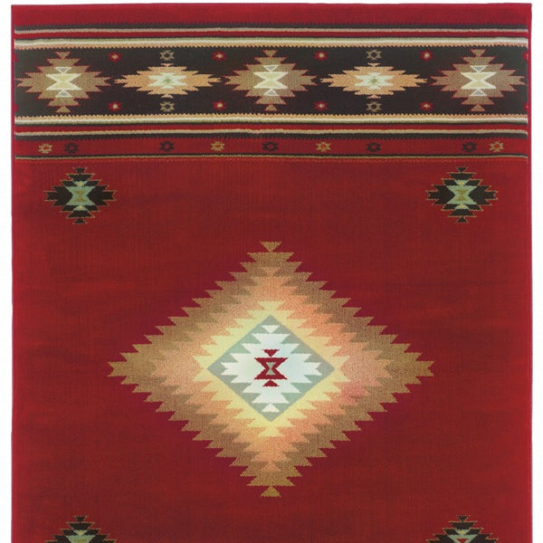 Homeroots 8' X 11' Red And Beige Ikat Pattern Area Rug Red,Green Polypropylene 387989