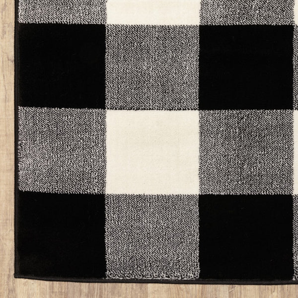 Homeroots 2' X 8' Monochromatic Gingham Pattern Indoor Runner Rug Black,Ivory Polypropylene 388016