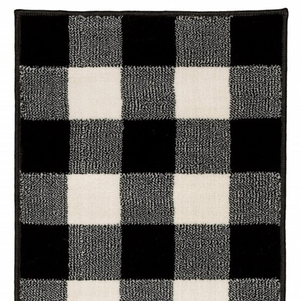 Homeroots 2' X 8' Monochromatic Gingham Pattern Indoor Runner Rug Black,Ivory Polypropylene 388016