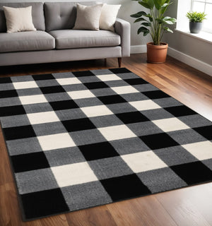 HomeRoots 5' Timeless Black and Ivory Gingham Area Rug - Durable, Easy Care, Perfect for High-Traffic Spaces 5' X 7' 388031