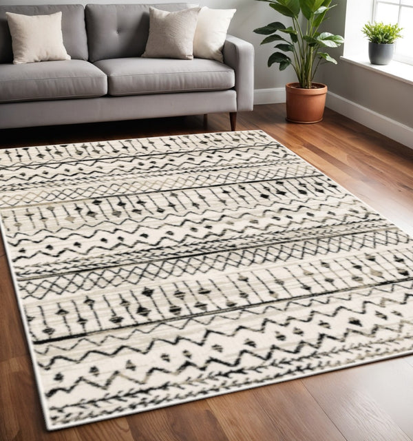 HomeRoots 5' Contemporary Ivory and Black Abstract Geometric Distressed Area Rug for Modern Living Spaces 5' X 7' 388032