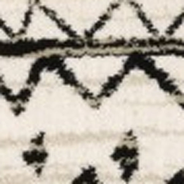 HomeRoots 5' Contemporary Ivory and Black Abstract Geometric Distressed Area Rug for Modern Living Spaces 7' X 9' 388044