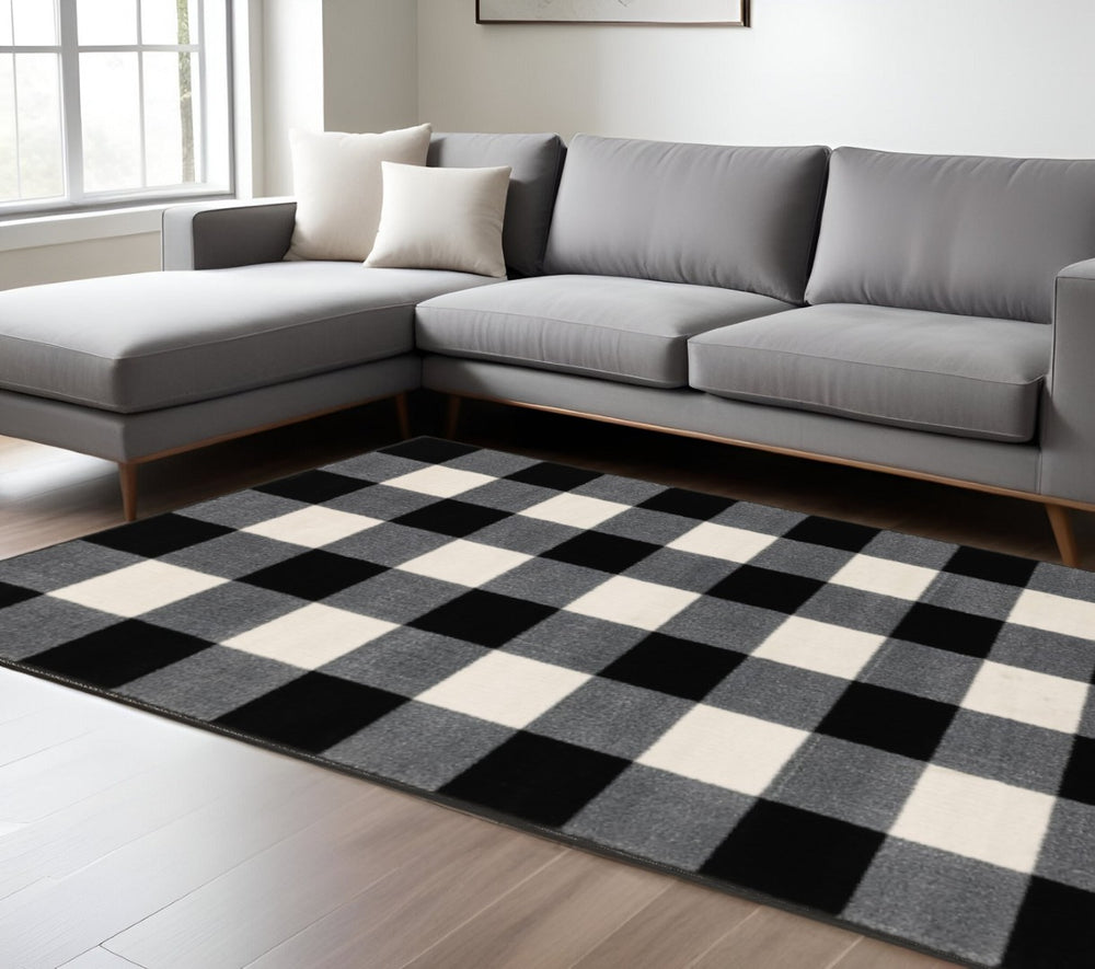 HomeRoots 5' Timeless Black and Ivory Gingham Area Rug - Durable, Easy Care, Perfect for High-Traffic Spaces 8' X 10' 388049
