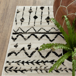 HomeRoots 5' Contemporary Ivory and Black Abstract Geometric Distressed Area Rug for Modern Living Spaces 8' X 10' 388050