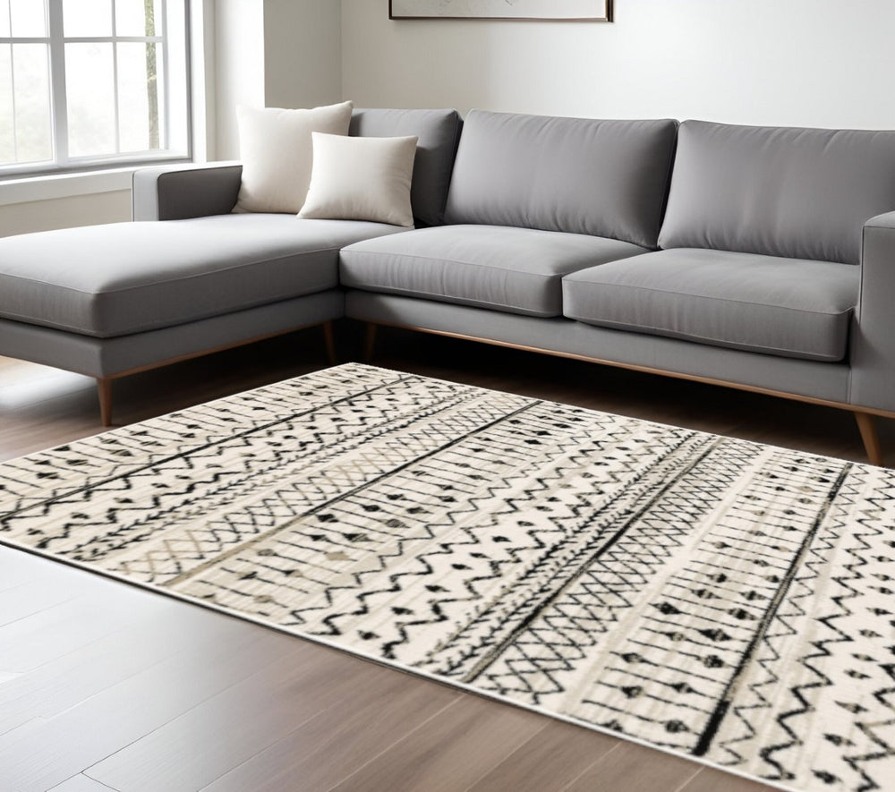 HomeRoots 5' Contemporary Ivory and Black Abstract Geometric Distressed Area Rug for Modern Living Spaces 8' X 10' 388050