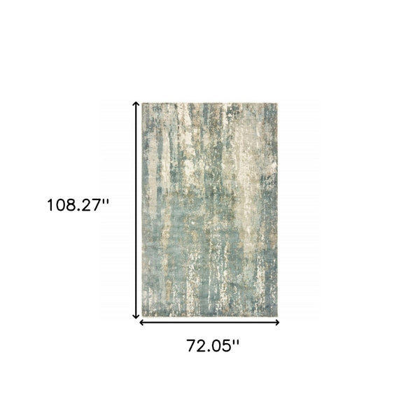 HomeRoots 3' Blue and Gray Abstract Splash Indoor Rug – Artful Design for Contemporary Hallways and Entryways 6' X 9' Rectangle 388084