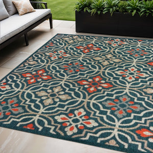 HomeRoots 5' Moroccan Indoor/Outdoor Area Rug - Vibrant Blue & Orange Quatrefoil Design for Any Space Teal/ Orange 5'3" x 7'3" 388361