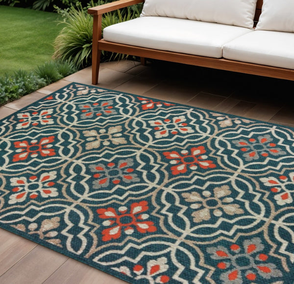 HomeRoots 5' Moroccan Indoor/Outdoor Area Rug - Vibrant Blue & Orange Quatrefoil Design for Any Space Teal/ Orange 7'10" x 10' 388363