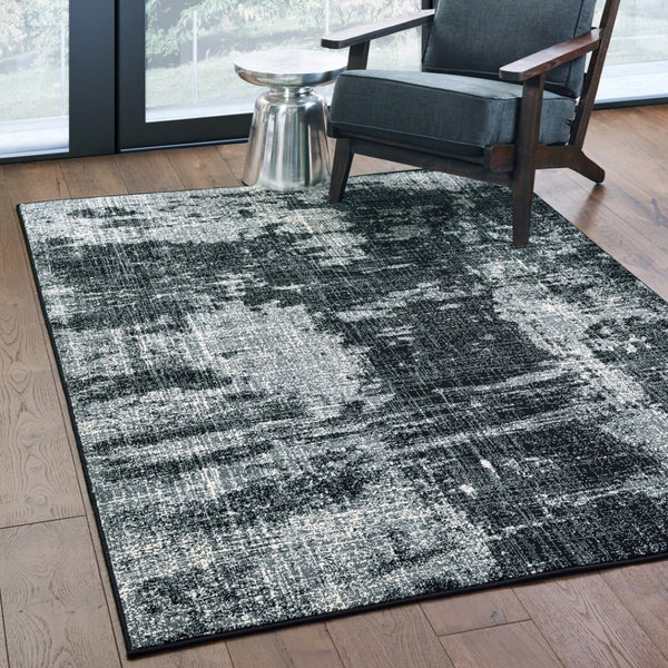 HomeRoots 10' Black and Ivory Abstract Distressed Area Rug - Stylish, Durable, Stain-Resistant Design for Modern Homes 9' X 12' 388410