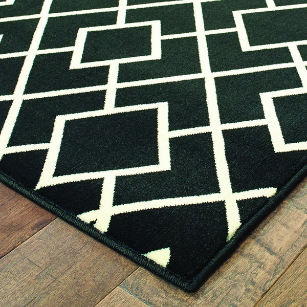 HomeRoots 10' Black and Ivory Diamond Area Rug - Modern Style, Durable, Stain-Resistant for High-Traffic Areas 9' X 12' 388416