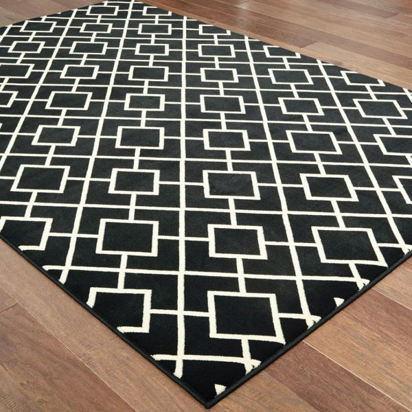 HomeRoots 10' Black and Ivory Diamond Area Rug - Modern Style, Durable, Stain-Resistant for High-Traffic Areas 9' X 12' 388416