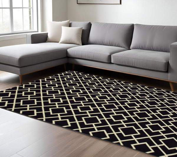 HomeRoots 10' Black and Ivory Diamond Area Rug - Modern Style, Durable, Stain-Resistant for High-Traffic Areas 9' X 12' 388416