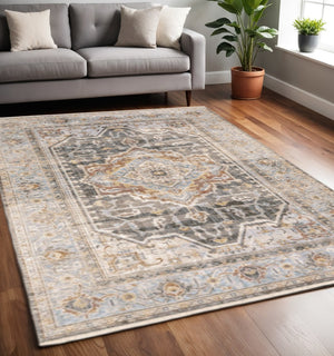 HomeRoots 10' Gray and Blue Medallion Distressed Area Rug - Vintage Charm for Family Rooms and Offices 5' X 8' Rectangle 388427