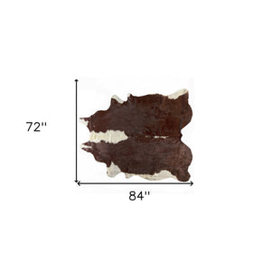 Homeroots 6' X 7' Brown And White Natural Cowhide Area Rug  Cowhide 388524