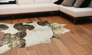 Homeroots 6' X 7' Dark Brown White And Gold Natural Cowhide Area Rug  Cowhide 388526