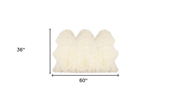HomeRoots 3' X 5' Trio Natural Sheepskin Area Rug - Luxurious Off-White Comfort for Home Décor & Style 388527