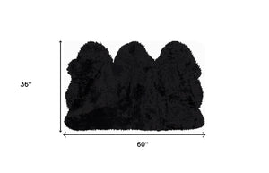 Homeroots 3' X 5' Black Natural Sheepskin Area Rug  Genuine Sheepskin 388528