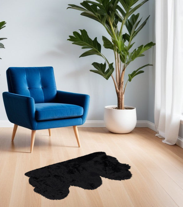 Homeroots 3' X 5' Black Natural Sheepskin Area Rug  Genuine Sheepskin 388528