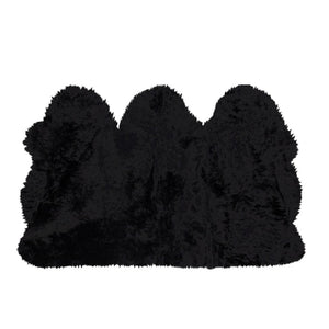 HomeRoots 3' X 5' Black Natural Sheepskin Area Rug - Luxurious, Hypoallergenic, and Versatile for Any Space 388528
