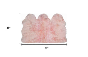 Homeroots 3' X 5' Pink Natural Sheepskin Area Rug  Genuine Sheepskin 388532