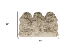 Homeroots 3' X 5' Taupe Natural Sheepskin Area Rug  Genuine Sheepskin 388533
